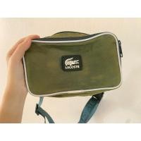 ราคา Lacoste กระเป๋าคาดอก แบรนด์แท้ มือสอง เคยใช้ไม่กี่ครั้งค่ะ (23958555554)