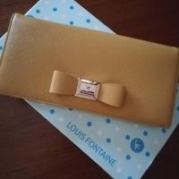 ราคา กระเป๋า​สตางค์​สี​เหลืองเข้มLouis​Fontaine​มือสอง (1245666825)