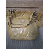 ราคา coach กระเป๋ามืสองสีเหลืองอ่อน (43562294860)