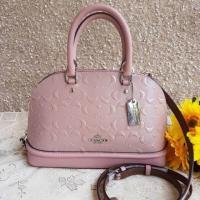 ราคา พร้อมส่ง กระเป๋า COACH ทรงโดมขนาดมินิหนังแก้วปั๊มลาย c นูน (1082257318)