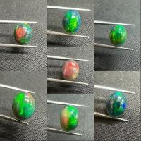ราคา โอปอลดำ ทรงรี ขนาด 9x7มม. อัญมณีธรรมชาติ 100% Black opal 9x7mm oval shape 100% natural gemstone (28736052318)
