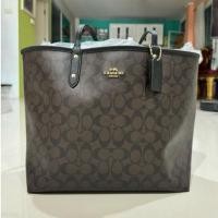 ราคา กระเป๋า COACH REVERSIBLE CITY TOTE IN SIGNATURE CANVAS (29558323436)