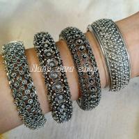 ราคา กำไลสีเงินรมดำ กำไลลายพิกุล กำไลเงินรมดำ เครื่องประดับล้านนา เครื่องประดับชุดไทย กำไรสำหรับผู้ใหญ่ รอบวง 20 เซนติเมตร (22720011130)