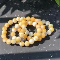 ราคา 13JA-YW สร้อยข้อมือหยกเจไดต์แท้ธรรมชาติ 100% สีธรรมชาติ หยกน้ำผึ้งขาวเหลือง13มิล (25714027658)
