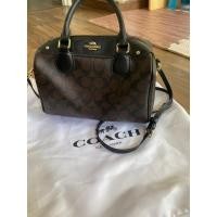 ราคา กระเป๋า coach ทรงหมอน แท้ % สีกาแฟ มือ2 (22969613380)