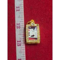 ราคา สิงฆ์ หลวงปู่หอม วัดชากหมากเขี้ยว เครื่องราง สิ่งตาแดงพร้อมกรอบทองไมครอนฝังพลอย (43559444758)