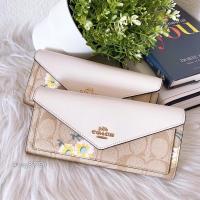 ราคา COACH SLIM ENVELOPE WALLET IN SIGNATURE CANVAS WITH DAISY PRINT #C3721 (9172521806)