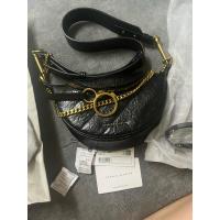ราคา กระเป๋า charles&keith รุ่นPhilomena Wrinkled-Effect Half-Moon Crossbody Bag – Black มือสอง ของแท้ (26056067546)