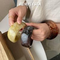 ราคา สร้อยข้อมือผู้หญิงอะคริลิก สไตล์วินเทจ กว้างและมีลายเต่าสี (41370058539)