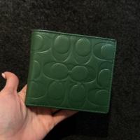 ราคา (kept unused) ส่งต่อกระเป๋าตังค์ผู้ชาย Coach สีเขียวเหนี่ยวทรัพย์ ไม่เคยใช้ (24345826033)