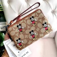 ราคา ✨น่ารักมากค่ะคล้องมือ Disney X Coach Corner Zip Wristlet In Signature Jacquard With Mickey✨ (24305086966)