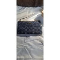 ราคา คล้องมือ coach ลาย c ผ้ายีนส์ (11427463586)