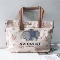 ราคา Coach DISNEY X COACH TOTE WITH ROSE BOUQUET PRINT AND DUMBO (COACH 91119) SV/CHALK MULTI (3055603442)