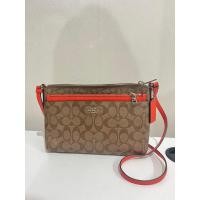ราคา ส่งต่อ Coach East/West Crossbody with Pop Up สีส้ม มือสอง สภาพใหม่! (20884090635)