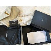 ราคา กระเป๋า YSL WOC9 สีครีม (25477903461)