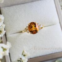 ราคา แหวนพลอยซิทริน เจียระไนทรงไข่ 8 x 10 mm.ประดับพลอยเพทายขาว (26980944896)