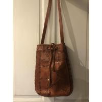 ราคา กระเป๋าสะพายหนังแท้ทรงขนมจีบ มือสอง (6055472997)