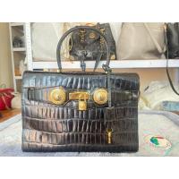 ราคา กระเป๋าหนังแท้ทรงถือมือสอง (25442086985)