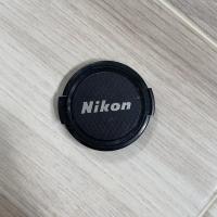 ราคา ฝาปิดหน้าเลนส์ nikon ขนาด 52 mm. แท้ (7685425445)