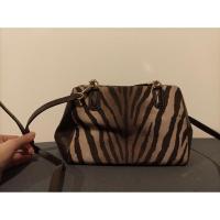 ราคา กระเป๋า Coach แท้ มือ2 ลายเสือ (12808505804)