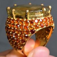 ราคา แหวนเงินแท้ชุบทอง แบบดาราราย พลอยเขียวส่องล้อมด้วยพลอยสเป็กซาไทต์ (24028690406)