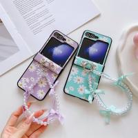 ราคา Luken สีเขียวสีม่วงเต็มหน้าจอ Chrysanthemum เคสโทรศัพท์ผ้าไหมโบว์สร้อยข้อมือมุกสําหรับ Galaxy Z Flip5 5G ZFlip5 Zflip6 ZFlip5 สําหรับ Oppo ค้นหา N2 Flip N3 Flip (29181416368)