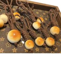 ราคา งาช้างแท้ถ่านย่างบุญจี้ สำหรับแขวนโทรศัพท์มือถือ กุญแจ และรถ ในสไตล์แฟชั่น (41423901002)