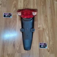 ราคา ไฟท้าย พร้อมบังโคลนหลัง wave100 S ubox ปี2005-2008 (17362081047)