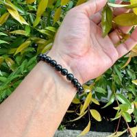 ราคา หินสีนำโชค สร้อยข้อมือหยกแท้ กำไลหยกแท้ หยกดำส่องแซมเขียว 7.7 มิล กำไลหยกดำ ข้อมือหยกดำ หยกพม่า หยกดำส่องเขียว เงางาม (24644867339)