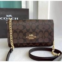 ราคา COACH FLAP CLUTCH CROSSBODY IN SIGNATURE BROWN BLACK (28641228141)