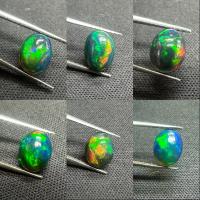 ราคา โอปอลดำ ทรงรี ขนาด 9x7มม. อัญมณีธรรมชาติ 100% Black opal 9x7mm oval shape 100% natural gemstone (29486048195)