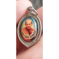 ราคา ล็อกเก็ต หลวงปู่มั่น ภูริทัตโต วัดป่าสุทธาวาส จังหวัดสกลนคร ด้านหลัง พระประจำวันเสาร์. (57150842963)