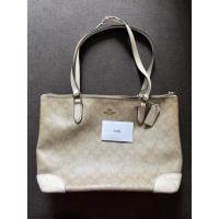 ราคา Coach Zip Top Coach in Signature แท้ มือสอง#coach แท้ (10094762312)