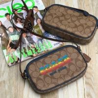 ราคา พร้อมส่งของแท้ CROSSBODY POUCH IN SIGNATURE CANVAS WITH RAINBOW COACH ANIMATION F73066 (2805642060)