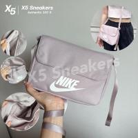 ราคา Nike ของแท้ 100% กระเป๋าสะพายข้างสีชมพูตุ่น (29154999485)