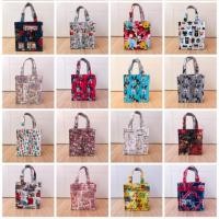 ราคา (พร้อมส่ง) กระเป๋าผ้าเคลือบกันน้ำ แนวตั้งรุ่น TS (ใบเล็ก) (1695009083)