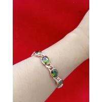ราคา #สร้อยข้อมือนาคพลอยสีเขียวส่อง (23631875963)