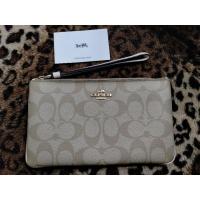 ราคา COACH คล้องมือ L สีขาว (23778657312)