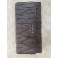 ราคา กระเป๋าสตางค์หนังแท้สีน้ำตาล miu miu (27576395516)