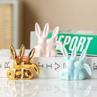 ราคา อัลสัน1ผู้ถือแหวนกระต่ายเซรามิก,ที่ไม่ซ้ํากันสุนทรียศาสตร์สไตล์การ์ตูนจูบคู่กระต่ายหุ่น,ผู้ถือแหวนตกแต่งงานฝีมือสร้างสรรค์อีสเตอร์กระต่ายเครื่องประดับสํานักง (48804317420)