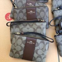ราคา Coach F58035 Corner Zip Wristlet in Signature Coated Canvas กระเป๋าคล้องมือ (1663553336)