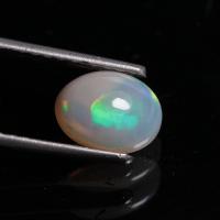 ราคา 1.05 ct พลอยแท้ ไวท์ โอปอล (White opal) เอธิโอเปีย เหลือบรุ้ง ทรงไข่หลังเบี้ย (25852373535)