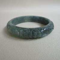ราคา กำไลหยกพม่า Jadeite type A แกะสลักลายมังกร ทรงกลมท้องแบน ขนาดวงใน 55.6mm กว้าง 13.2mm สวมใส่ได้ทุกเพศ (25078570144)