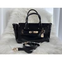 ราคา พร้อมส่ง กดสั่งซื้อได้เลยค่ะ กระเป๋าถือ Coach Swagger 27 สีดำ อะไหล่ทอง ของแท้ค่ะ ‼️ (7506812240)