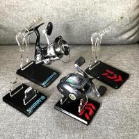 ราคา แท่นวางรอกตีเหยื่อปลอม ที่วางรอกเบท รอกสปินนิ่ง Daiwa Shimano Stella Abu Reel Display (12089845199)