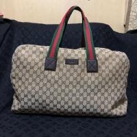 ราคา กระเป๋าเดินทางGucci ผ้าสายเขียวแดง ของแท้มือสอง (4200234069)