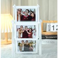 ราคา (MM00)กรอบรูปชิงช้าสวรรค์ หมุนได้360องศา พร้อมรูปถ่าย12รูปและแถมรูปถ่ายขนาด2X3 ให้อีก3รูป (26539522046)