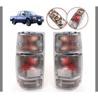 ราคา ไฟท้าย TFR มังกรทอง อีซุซู อีซุซู ISUZU CARMEO หน้าหนู รุ่นปี 1995 เลนส์ใส หลอดแดง ไฟแต่ง TFR มังกร 1 คู่ ขจัดส่งไว (14899726846)