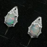 ราคา ต่างหู โอปอล Opal พลอยแท้ รูปไข่หลังเบี้ย ล้อม CZ ขนาด 6×8 มม.ตัวเรือนเงิน 925 (5448661698)