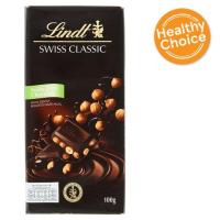 ราคา แนะนำ!! ลินด์ สวิส คลาสสิค ดาร์กช็อกโแลต สอดไส้เฮเซลนัทเต็มเมล็ด 100กรัม Lindt Swiss Classic Dark Hazelnut Swiss Chocol (7293807139)